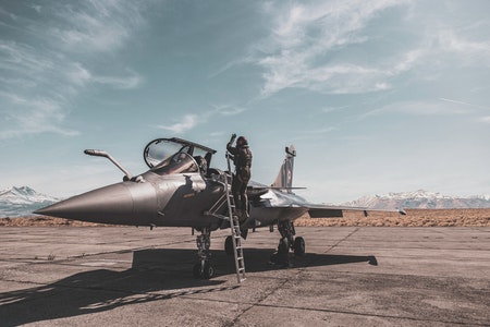 An army pilot is a specialist who flies helicopters and other aircraft